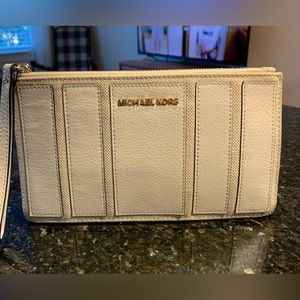 Michael Kors cream wristlet